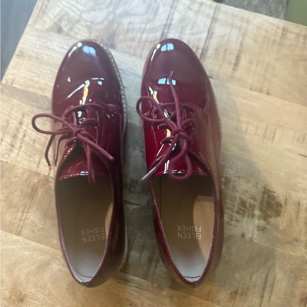 Eileen Fisher patent leather wedge oxfords.
Size 8.  Burgundy color